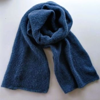 
Alpaca Wool&nbsp; Silk Scarves Ireland | Dark Blue
Dark Blue, our finest &nbsp;wool and silk scarves Ireland collection is hand knitted from an exclusive blend of alpaca Wool ( highest quality) and Silk yarn.(77% Alpaca &ndash; 23% Mulberry Silk).
Seriously soft and luxurious, you can wrap yourself up inside like in a cocoon.
This limited-edition collection offers a selection of timeless colours, reflecting the changing shades of the seasons &ndash; with pinks, heathers, rustics, greys, and greens.
A perfect gift for him or her -Beautiful with both formal and casual looks, this scarf elevates any outfit with a touch of quiet luxury &ndash; a timeless investment piece.
Colour: Dark Blue

Treasured for its unmatched softness, breathability and warmth.
Each scarf is hand knitted with love -a unique piece
Feels exquisite against the skin
Generous Size -One size fits all (170cm x 35cm.)
Perfect for chilly mornings or elegant evenings
Beautifully gift wrapped and ready for giving- from my studio in Dublin Ireland

&nbsp;