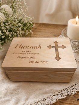 A Communion Keepsake Box from Little and Loveable is a meaningful way to celebrate a sacred milestone in a child&rsquo;s life. Lovingly chosen by you and carefully handcrafted by us in South Carlow, Ireland, each box offers a safe and beautiful space to hold treasured mementos from this special day&mdash;rosary beads, prayer cards, photos, and heartfelt notes.
Crafted from robust pinewood walls with a birchwood top and base, our boxes feature hidden metal hinges and a snug internal lip for secure closure. Rounded sides and bevelled detailing add a soft, elegant finish, blending durability with grace.
Each box is hand-painted or stained, then gently sanded to a smooth, refined texture. Personalised with names, dates, or a special message, it becomes a one-of-a-kind keepsake&mdash;designed to honour faith, family, and the joy of First Holy Communion.
A gift for all time&mdash;made in Ireland, made with care, made to last.
Props not included.