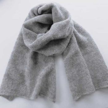 
Alpaca Wool &amp; Silk Scarves Ireland | Grey
Grey our finest &nbsp;wool and silk scarves Ireland collection is hand knitted from an exclusive blend of alpaca Wool ( highest quality) and Silk yarn.(77% Alpaca &ndash; 23% Mulberry Silk).
Seriously soft and luxurious, you can wrap yourself up inside like in a cocoon.
This limited-edition collection offers a selection of timeless colours, reflecting the changing shades of the seasons &ndash; with pinks, heathers, rustics, greys, and greens.
A perfect gift for him or her -Beautiful with both formal and casual looks, this scarf elevates any outfit with a touch of quiet luxury &ndash; a timeless investment piece.
Colour: Grey

Treasured for its unmatched softness, breathability and warmth.
Each scarf is hand knitted with love -a unique piece
Feels exquisite against the skin
Generous Size -One size fits all (170cm x 35cm.)
Perfect for chilly mornings or elegant evenings
Beautifully gift wrapped and ready for giving- from my studio in Dublin Ireland

&nbsp;