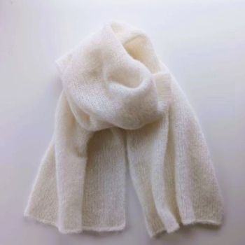 
Alpaca Wool&nbsp;&amp; Silk Scarves Ireland |&nbsp;Soft White
Soft White, our finest &nbsp;wool and silk scarves Ireland collection is hand knitted from an exclusive blend of alpaca Wool ( highest quality) and Silk yarn.(77% Alpaca &ndash; 23% Mulberry Silk).
Seriously soft and luxurious, you can wrap yourself up inside like in a cocoon.
This limited-edition collection offers a selection of timeless colours, reflecting the changing shades of the seasons &ndash; with pinks, heathers, rustics, greys, and greens.
A perfect gift for him or her -Beautiful with both formal and casual looks, this scarf elevates any outfit with a touch of quiet luxury &ndash; a timeless investment piece.
Colour: Soft White

Treasured for its unmatched softness, breathability and warmth.
Each scarf is hand knitted with love -a unique piece
Feels exquisite against the skin
Generous Size -One size fits all (170cm x 35cm.)
Perfect for chilly mornings or elegant evenings
Beautifully gift wrapped and ready for giving- from my studio in Dublin Ireland

&nbsp;