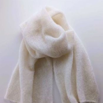 
Our Alpaca wool and silk scarves are handcrafted from two of the most luxurious natural fibres in the world &ndash; (80% Alpaca | 20% Silk).
Feather light and superbly soft and warm, this scarf is the perfect finishing touch to any coat or jacket.
This limited-edition collection offers a selection of timeless colours, inspired by the changing shades of the Irish Atlantic Way.
A timeless, elegant wardrobe essential, it makes the perfect luxury gift for any occasion.
Colour: Soft White

Feels exquisite against the skin
Size: Generous size 170 x 35 cm
Beautifully gift wrapped with ribbon, from my studio in Dublin, Ireland
Oeko-Tex certified and ethically sourced
Care: Hand wash in warm water using a mild detergent. Lay on a flat surface to dry.

&nbsp;
