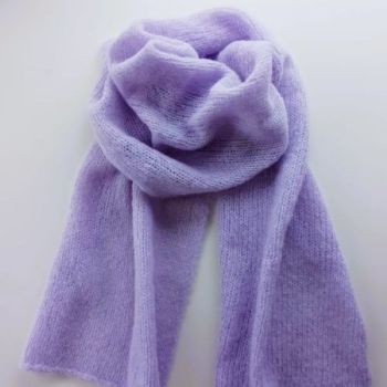 
Alpaca Wool &amp; Silk Scarves Ireland | Lilac
Lilac, our finest &nbsp;wool and silk scarves Ireland collection is hand knitted from an exclusive blend of alpaca Wool ( highest quality) and Silk yarn.(77% Alpaca &ndash; 23% Mulberry Silk).
Seriously soft and luxurious, you can wrap yourself up inside like in a cocoon.
This limited-edition collection offers a selection of timeless colours, reflecting the changing shades of the seasons &ndash; with pinks, heathers, rustics, greys, and greens.
A perfect gift for him or her -Beautiful with both formal and casual looks, this scarf elevates any outfit with a touch of quiet luxury &ndash; a timeless investment piece.
Colour: Lilac&nbsp;

Treasured for its unmatched softness, breathability and warmth.
Each scarf is hand knitted with love -a unique piece
Feels exquisite against the skin
Generous Size -One size fits all (170cm x 35cm.)
Perfect for chilly mornings or elegant evenings
Beautifully gift wrapped and ready for giving- from my studio in Dublin Ireland

&nbsp;