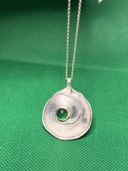 We create with recycled silver or silver clay. We use copper clay of copper that has been recycled into wire or sheet metal. Any coins that we use have been circulated but are in good condition. We use different materials, but all are recycled.&nbsp;