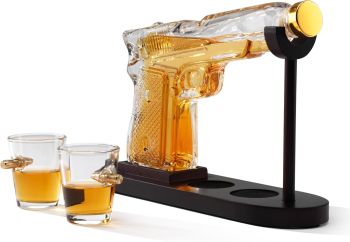 
A striking pistol-shaped borosilicate glass decanter with a mahogany-effect stand and two bullet-embedded shot glasses. Perfect for whisky, spirits, gifting and home bars.

&nbsp;