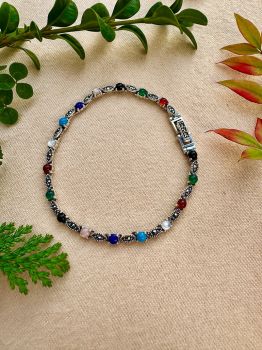 Brighten up your jewelry collection with our Multi-Gemstone Sterling Silver Marcasite Bracelet! A stunning blend of colors and a beautiful design, it's a must-have for any jewelry lover.