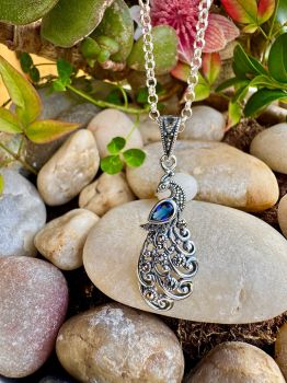 &nbsp;
Peacock Marcasite Sterling Silver Necklace&nbsp;
Metal: Sterling Silver
Gem: Lab created Sapphire or Genuine Black Onyx,&nbsp; Marcasite
Pendant Size: 62mm x 22mm
&nbsp;