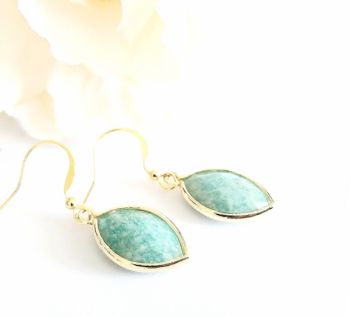 Gorgeous gold framed natural amazonite gemstones, suspended from gold plated, nickel free ear wires (suitable for sensitive ears). Beautiful, light weight and comfortable to wear. Add some extra style and elegance to your look with these stunning gemstones...The drop on these earrings is approx. 2.2cm/0.86ins. Amazonite is thought to be a powerful gemstone with healing properties that promote emotional balance, and mental clarity&hellip;.. They arrive in a pretty organza bag, and have free shipping!