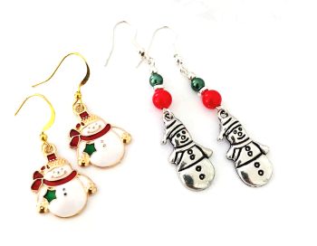 Two pairs of Christmas earrings with cute snowmen in gorgeous silver, gold, white, red and green, suspended from gold plated, nickel free ear hooks./silver plated, nickel free ear hooks.&nbsp; Lightweight and easy to wear, great for Christmas parties/gifting/stocking fillers.... They arrive in a pretty organza bag, and have free shipping!