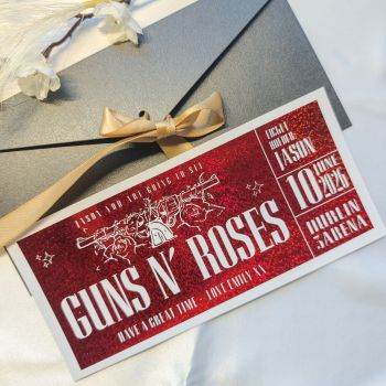 Give a concert surprise with a personalised Guns N' Roses foil ticket. Each ticket is handmade in Ireland and finished with reflective metallic foil. It arrives with a kraft envelope and features a layout inspired by real event tickets.
About This Guns N' Roses Foil Ticket
This keepsake ticket is designed for fans of Guns N' Roses. It works for gift reveals and display keepsakes. The foil gives a mirror shine and the personal message makes the surprise stronger. Ideal for birthdays, anniversaries or concert announcements.