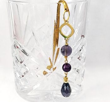 Hanmdade bookmark in antique gold, created with an a selection of beautiful glass beads in deep purple. A gorgeous sparkly bookmark, great for Christmas gifting/stocking fillers! It arrives in a pretty organza bag, and has free shipping!