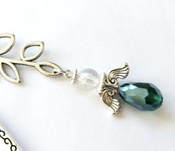 Hanmdade bookmark in antique silver, created with a cute glass angel in deep green, with a beautiful iridescent clear glass bead and silver plated angel wings and halo&hellip;A gorgeous festive bookmark, great for Christmas gifting/stocking fillers! It arrives in a pretty organza bag, and has free shipping!