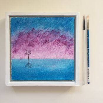 A minimalist pink and blue, simple winter tree landscape painting. It is painted with high-quality acrylic paint and the tree is painted using Indian ink. It is not a print. It is framed. The simple, fun and bright colours of this original minimalist painting would make a wonderful gift for her!&nbsp; Scroll down to see full details about this painting below.