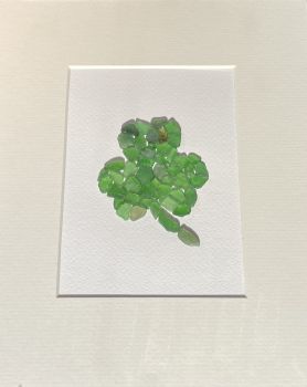 Sea glass Shamrock ! Sea glass was hand picked &nbsp;from the beaches and rocks of Sandycove Co Dublin. Each piece is unique and handmade locally. Frames with glass fronts panel are sourced from Wicklow. Free postage in Ireland . Give a sustainable handmade Irish gift!
