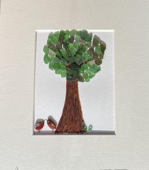 Sea glass Tree with Robins! Sea glass was hand picked &nbsp;from the beaches and rocks of Sandycove Co Dublin. Each piece is unique and handmade locally. Frames with glass fronts panel are sourced from Wicklow. Free postage in Ireland . Give a sustainable handmade Irish gift!