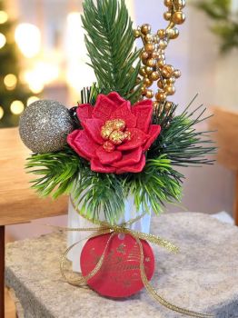 Handmade scented soap Christmas poinsettia nicely decorated in handmade white vase