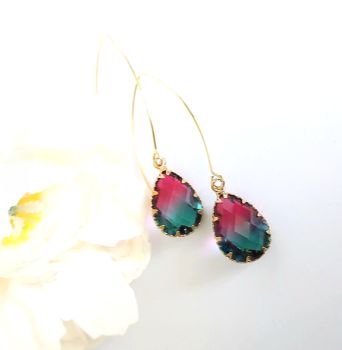 Beautiful bespoke earrings, created with gold framed faceted glass drops in shades of teal and deep pink&hellip; suspended from polished, stainless steel earwires in gold. The drop on these lovely earringss is approx. 6.3cm/2.4ins. They are also lightweight and comfortable to wear&hellip; Elevate your style with these gorgeous pieces! They arrive in a pretty organza bag&hellip; and have free shipping! 