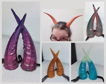 GEOMETRIC DRAGON HORNS - Headset decor or Elastic Hair Band -&nbsp; Ready to Go &amp; Custom Made colors - dressing up, cosplay, halloween, festivals fantasy
3D designed, printed, polished &amp; molded. Made with resin and carefully painted with details.
Perfect for cosplay, halloween, festivals and fantasy meetings :P
Available as:
🌙 Ready to go (as picture Shown)
or
🌙 Custom Made
~~&gt; you can choose the finish as Headet decor (includes 2 velcro straps) or elastic hairband.
The horns and cord weigh around 147 grams.
🌙 If custom made chosen, let me know here, from the last picture which colors you would like it made with.
I have dyes, pigments, glitters, flakes &amp; alcohol inks.