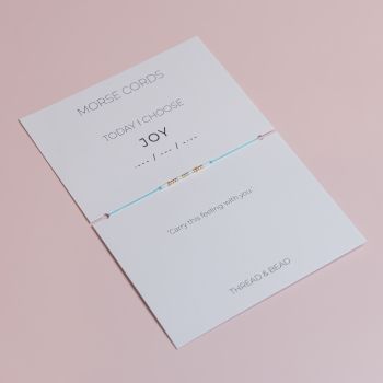 This Morse Cord bracelet hides a&nbsp;secret message&nbsp;- the word&nbsp;JOY, spelled with a mix of&nbsp;24k gold-plated Miyuki beads and glass Miyuki beads.&nbsp;
It&rsquo;s&nbsp;adjustable, delicate, and&nbsp;made to order. You can customise the thread and the non-gold bead colours to match your style, your outfit, or your current emotional weather forecast.
Perfect as a gift, or as your own personal wink from the universe.