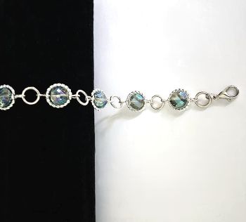 Handmade silver plated bracelet, created with gorgeous electroplated glass beads, in sparkly blue/green. A lovely bespoke, elegant bracelet&hellip; perfect for special occasions It arrives in a pretty organza bag, and has free shipping!