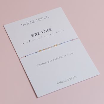 This Morse Cord bracelet hides a secret message:&nbsp;BREATHE, spelled with a mix of&nbsp;24k gold-plated Miyuki beads and glass Miyuki beads.
It&rsquo;s&nbsp;adjustable, delicate, and&nbsp;made to order. You can customise the thread and the non-gold bead colours to match your style, your energy, or the pace you want to move through life with.
Perfect as a gift, or as your own steady anchor.