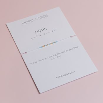 This Morse Cord bracelet hides a secret message: HOPE,&nbsp;spelled with a mix of&nbsp;24k gold-plated Miyuki beads and glass Miyuki beads.
It&rsquo;s&nbsp;adjustable, delicate, and&nbsp;made to order. You can customise the thread and the non-gold bead colours to match the feeling you want to carry, calm, bright, steady, or anything in between.
Perfect as a gift, or as your own gentle anchor, a secret message on your wrist reminding you that even the smallest spark of hope is worth holding onto.