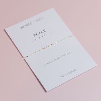 This Morse Cord bracelet hides a secret message: PEACE, spelled with a mix of&nbsp;24k gold-plated Miyuki beads and glass Miyuki beads.
It&rsquo;s&nbsp;adjustable, delicate, and&nbsp;made to order. You can customise the thread and the non-gold bead colours to create your own personal calm - something soft, something soothing, something that feels like a deep exhale.
Perfect as a thoughtful gift or as your own wearable pause button, a small reminder to slow down, breathe, and choose what brings you back to yourself.