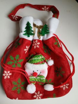 Red colour drawstring gift bag for the smaller gifts.