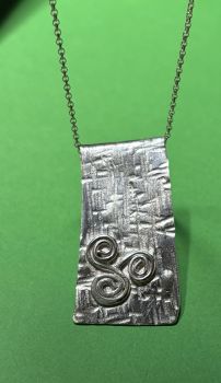 We create with recycled silver or silver clay. We use copper clay of copper that has been recycled into wire or sheet metal. Any coins that we use have been circulated but are in good condition. We use different materials, but all are recycled.&nbsp;