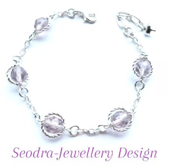 A bespoke silver plated bracelet, created with (8mm) Czech pressed glass beads, which are faceted&hellip;so, lots of sparkles! A gorgeous bracelet for any season.. the beads are a very light plum/pink colour, depending on the light. the bracelet is approx. 20cm/8ins in length&hellip; it&rsquo;s finished with an extension chain and cute heart charm. Extension chain is approx. 5cm/2ins in length&hellip; Elevate your style with this beautiful bespoke piece! It arrives in a pretty organza bag&hellip; and has free shipping!