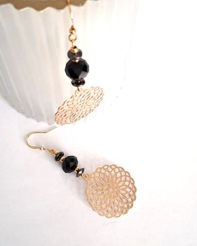 Handmade earrings, created with beautiful gold plated drops, black faceted glass beads, black hematite stones and gold plated beads. The ear hooks are gold plated and nickel free, suitable for sensitive ears.&nbsp; Elevate your style with these gorgeous bespoke earrings.... They arrive in a pretty organza bag, and have free shipping!