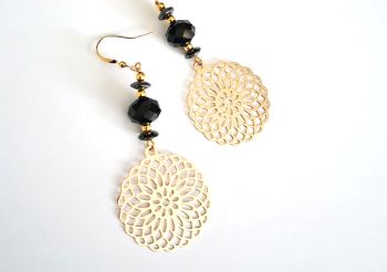 Handmade earrings, created with beautiful gold plated drops, black faceted glass beads, black hematite stones and gold plated beads. The ear hooks are gold plated and nickel free, suitable for sensitive ears.&nbsp; Elevate your style with these gorgeous bespoke earrings.... They arrive in a pretty organza bag, and have free shipping!