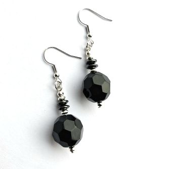 Handmade earrings, created in black and silver with beautiful faceted beads, hematite beads and silver plated beads and ear hooks ( the ear hooks are silver plated and nickel free, suitable for sensitive ears).&nbsp; &nbsp;Lightweight and easy to wear, stylish and bespoke... elevate your look with these beautiful earrings... They arrive in a pretty organza bag, and have free shipping