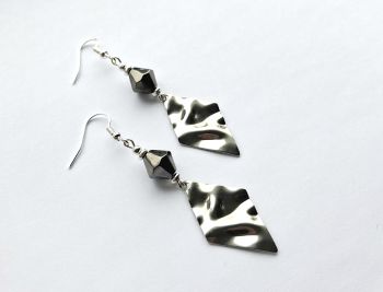 Handmade earrings, created with gorgeous, polished stainless steel drops, faceted, electroplated metal beads in graphite and silver plated beads. The ear hooks are silver plated and nickel free. (suitable for sensitive ears).&nbsp; These earrings are lightweight and comfortable to wear... Enhance your look with these lovely bespoke pieces. They arrive in a pretty organza bag, and have free shipping