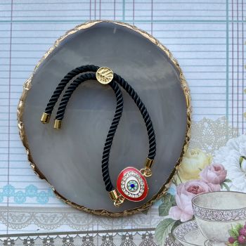 Fully adjustable cord bracelet.