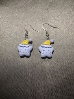 Sleepy star earrings are light blue with yellow nightcap