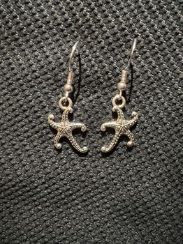 Swirly silver starfish earrings with fish hook backs&nbsp;
