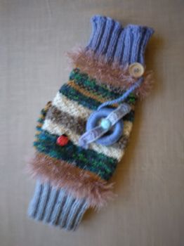 Handknit handwarmer for sensory stimulation.