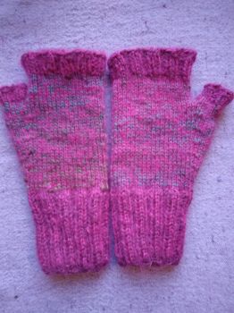 Handknitted fingerless gloves, pink with hint of green. Warm, soft, fluffy.