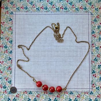Handcrafted stainless steel red turquoise necklace.