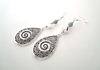 Beautiful bespoke earrings, handmade in Ireland with quality materials. Created with antique silver spiral drops and natural amazonite stones..&nbsp; Light, and comfortable to wear. Nickel free ear hooks. Perfect for lovers of semi precious gemstones!&nbsp;&nbsp;