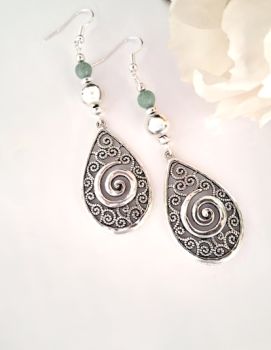 Beautiful bespoke earrings, handmade in Ireland with quality materials. Created with antique silver spiral drops and natural amazonite stones..&nbsp; Light, and comfortable to wear. Nickel free ear hooks. Perfect for lovers of semi precious gemstones!&nbsp;&nbsp;