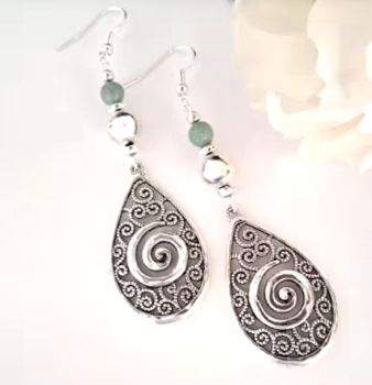 Beautiful bespoke earrings, handmade in Ireland with quality materials. Created with antique silver spiral drops and natural amazonite stones..&nbsp; Light, and comfortable to wear. Nickel free ear hooks. Perfect for lovers of semi precious gemstones!&nbsp;&nbsp;