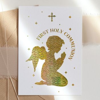 Celebrate this sacred milestone with our stunning First Holy Communion card, featuring a beautiful praying child silhouette with celestial foil detailing that catches the light.

Unique &amp; High-Quality: This isn't your average card. It's professionally printed on thick, premium paper for a standout look and feel
Symbolic Design: Features an elegant silhouette of a child in prayer, filled with a magical starry sky pattern in gorgeous foil, representing faith, innocence, and divine blessing
The Perfect Fit: The A6 size is just right&mdash;easy to mail and fits perfectly into standard envelopes. 10.5 cm x 14.8 cm / 4.1 in x 5.8 in
Your Personal Touch: With a blank inside, you have plenty of room to write a personal, heartfelt message that makes this special day extra memorable
Support Small Business: Your purchase helps an independent creator, making it a gift that gives back. All our cards are made in Ireland, in our small home studio
Kraft Envelope Included: Each card comes with a beautiful kraft envelope


Available in stunning foil colours including turquoise blue, gold, rose gold, and silver. The sparkling celestial pattern creates a reverent, magical look perfect for this holy occasion.