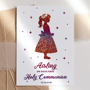 Make this sacred milestone truly unforgettable with our personalised First Holy Communion card, featuring a beautiful girl silhouette in her communion dress with exquisite foil detailing that catches the light.

Fully Personalised: Customised with the child's name and communion date, making it a treasured keepsake they'll cherish forever
Unique &amp; High-Quality: This isn't your average card. It's professionally printed on thick, premium paper for a standout look and feel
Symbolic Design: Features an elegant silhouette of a girl in her communion dress with a floral crown, filled with a magical starry pattern in gorgeous foil, representing faith, innocence, and divine blessing
The Perfect Fit: Available in A6 (10.5 cm x 14.8 cm / 4.1 in x 5.8 in) and A5 (14.8 cm x 21 cm / 5.8 in x 8.3 in) sizes - easy to mail and fits perfectly into standard envelopes
Your Personal Touch: With a blank inside, you have plenty of room to write a personal, heartfelt message that makes this special day extra memorable
Support Small Business: Your purchase helps an independent creator, making it a gift that gives back. All our cards are made in Ireland, in our small home studio
Kraft Envelope Included: Each card comes with a beautiful kraft envelope


Available in stunning foil colours including gold, rose gold, turquoise blue, and silver. The sparkling celestial pattern creates a reverent, magical look perfect for this holy occasion.