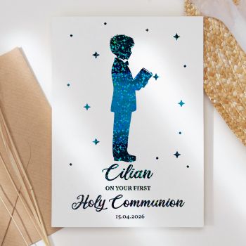 Make this sacred milestone truly unforgettable with our personalised First Holy Communion card, featuring a beautiful boy silhouette holding his prayer book with exquisite foil detailing that catches the light.

Fully Personalised: Customised with the child's name and communion date, making it a treasured keepsake they'll cherish forever
Unique &amp; High-Quality: This isn't your average card. It's professionally printed on thick, premium paper for a standout look and feel
Symbolic Design: Features an elegant silhouette of a boy in his communion suit holding a prayer book, filled with a magical starry pattern in gorgeous foil, representing faith, devotion, and divine blessing
The Perfect Fit: Available in A6 (10.5 cm x 14.8 cm / 4.1 in x 5.8 in) and A5 (14.8 cm x 21 cm / 5.8 in x 8.3 in) sizes - easy to mail and fits perfectly into standard envelopes
Your Personal Touch: With a blank inside, you have plenty of room to write a personal, heartfelt message that makes this special day extra memorable
Support Small Business: Your purchase helps an independent creator, making it a gift that gives back. All our cards are made in Ireland, in our small home studio
Kraft Envelope Included: Each card comes with a beautiful kraft envelope


Available in stunning foil colours including turquoise blue, gold, rose gold, and silver. The sparkling celestial pattern creates a reverent, magical look perfect for this holy occasion.