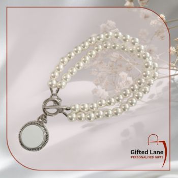 Personalised Pearl Bracelet is a personalised gift accessory for a occasion or a keepsake of a special day. It is a pearl bracelet with circle charm which can be personalised with a picture and with a date or name on it. Another special personalised gift from Gifted Lane