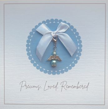 Touching Keepsake Card for Baby Loss
It can be difficult to find the right words during such a heartbreaking time, but this card is a thoughtful way to let someone know you're thinking of them.

Heartfelt Message:&nbsp;Designed to offer comfort and support.
Angel Trinket:&nbsp;A delicate angel charm included as a keepsake to offer a sense of peace and remembrance.
A Card to Cherish:&nbsp;A meaningful card to let them know you care and are there for them, with a token they can keep as a remembrance.

A beautiful way to express sympathy and provide a bit of solace during an incredibly difficult time.