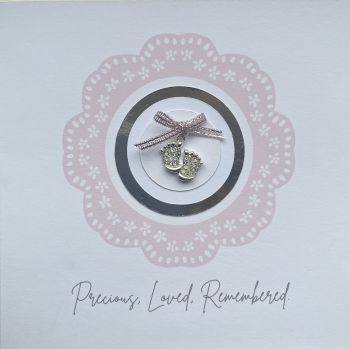 Touching Keepsake Card for Baby Loss
It can be difficult to find the right words during such a heartbreaking time, but this card is a thoughtful way to let someone know you're thinking of them.

Heartfelt Message:&nbsp;Designed to offer comfort and support.
Angel Trinket: A delicate footprint gem charm included as a keepsake to offer a sense of peace and remembrance.
A Card to Cherish:&nbsp;A meaningful card to let them know you care and are there for them, with a token they can keep as a remembrance.

A beautiful way to express sympathy and provide a bit of solace during an incredibly difficult time.