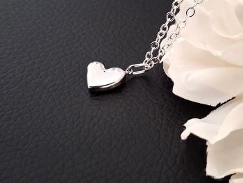 Gorgeous pendant, made in Ireland with quality materials. Created with a highly polished stainless steel heart, suspended from a silver plated chain.&nbsp; Suitable for everyday wear, or for special occasions.&nbsp; A beautiful elegant pendant, perfect for gifting, or a personal treat!&nbsp; It arrives in a pretty velvet pouch, and has free shipping!