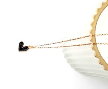 Beautiful pendant, made in Ireland with quality materials. Created with a dainty gold tone heart, beautifully enamelled in black, suspended from a fine stainless steel chain in gold.&nbsp; Elegant and lightweight, great for everyday wear, or special occasions.&nbsp; Perfect for gifting, or a personal treat!&nbsp;